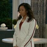 Naomi’s track suit with red side stripes on Beyond the Gates