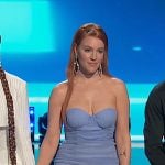 Olivia Kuper Harris’s purple strapless sheer gown on The Voice