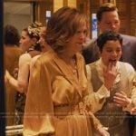 Patty’s beige satin wrap top and belted pants on The Studio