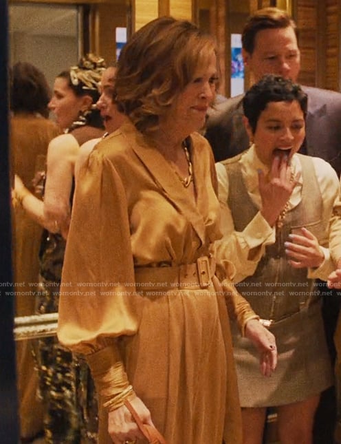 Patty’s beige satin wrap top and belted pants on The Studio