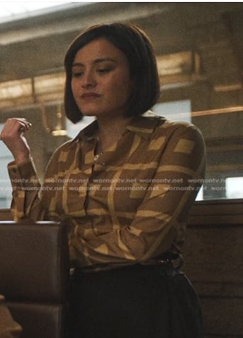 Quinn's brown geometric print shirt on The Studio