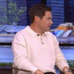 Adam Devine’s white polo sweater on Live with Kelly and Mark