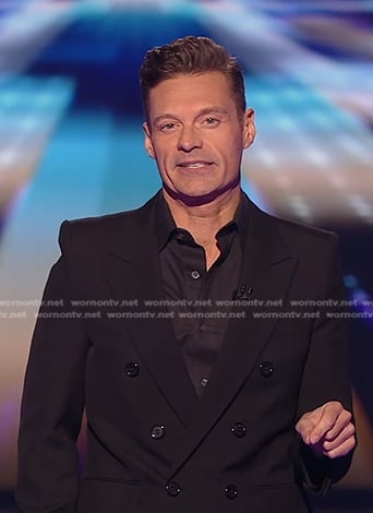 Ryan Seacrest’s black double breasted blazer on American Idol
