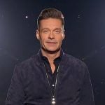 Ryan Seacrest’s navy suede bomber jacket on American Idol