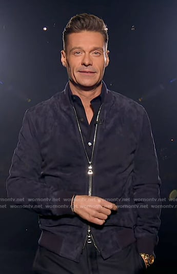 Ryan Seacrest’s navy suede bomber jacket on American Idol