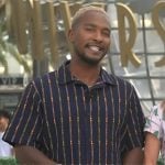 Scott’s multicolored stripe shirt on Access Hollywood