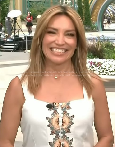 Kit’s white floral print linen dress on Access Hollywood