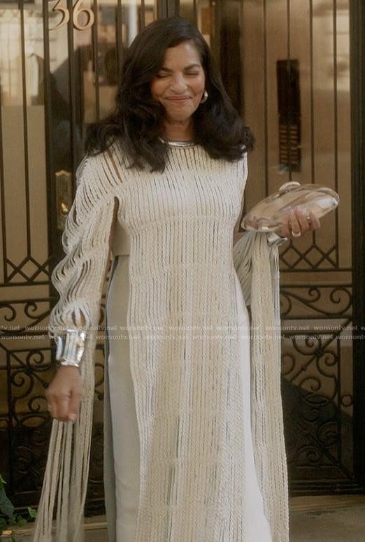 Seema's metallic clutch on And Just Like That