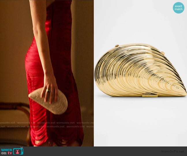 Simkhai Bridget Oyster Bag worn by Devon DeWitt (Meghann Fahy) on Sirens