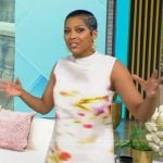 Tamron’s tie dye sleeveless dress on Tamron Hall Show