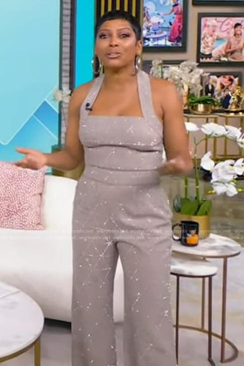 Tamron’s gray metallic check jumpsuit on Tamron Hall Show
