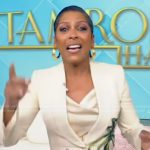 Tamron’s white banana leaf embellished blazer on Tamron Hall Show
