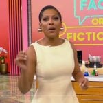 Tamron’s yellow sleeveless mini dress on Tamron Hall Show