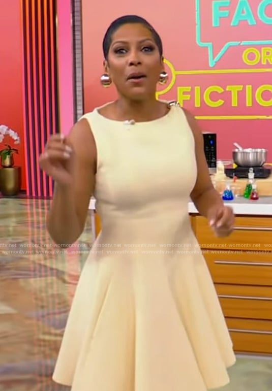 Tamron's yellow sleeveless mini dress on Tamron Hall Show