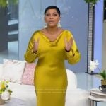 Tamron’s yellow satin cowl neck dress on Tamron Hall Show