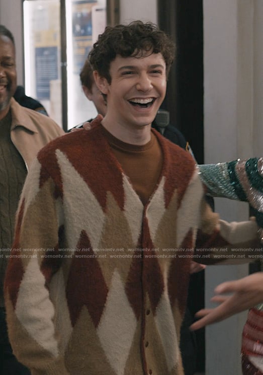 Teddy’s argyle print cardigan on Elsbeth