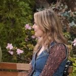 Tessa’s snake print top and braided denim vest on The Young and the Restless