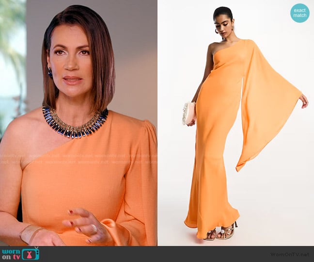 ASOS One shoulder exaggerated sleeve maxi dress in bright orange worn by Julia Lemigova (Julia Lemigova) on The Real Housewives of Miami