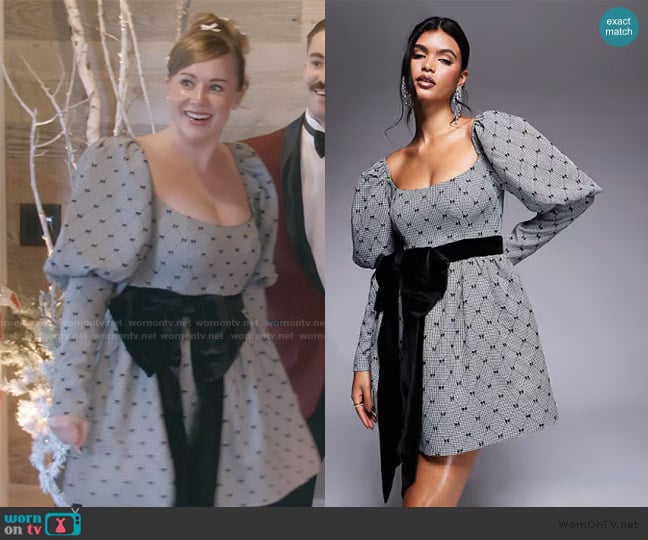 ASOS Flocked bow puff sleeve mini dress with velvet bow worn by Whitney Leavitt on The Secret Lives of Mormon Wives