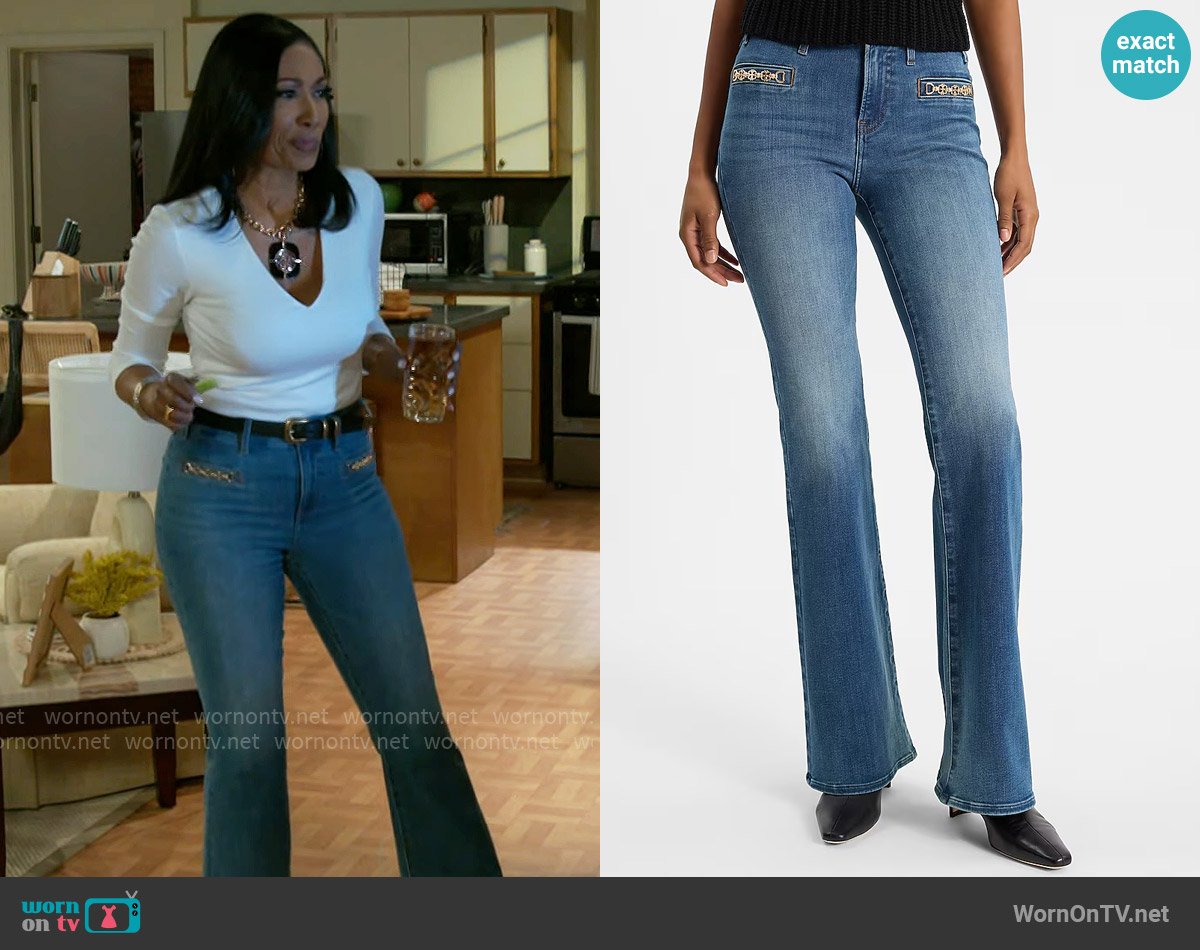 Express Mid Rise Medium Wash Horsebit FlexX '70s Flare Jeans worn by Dana 'Leslie' Thomas (Trisha Mann-Grant) on Beyond the Gates