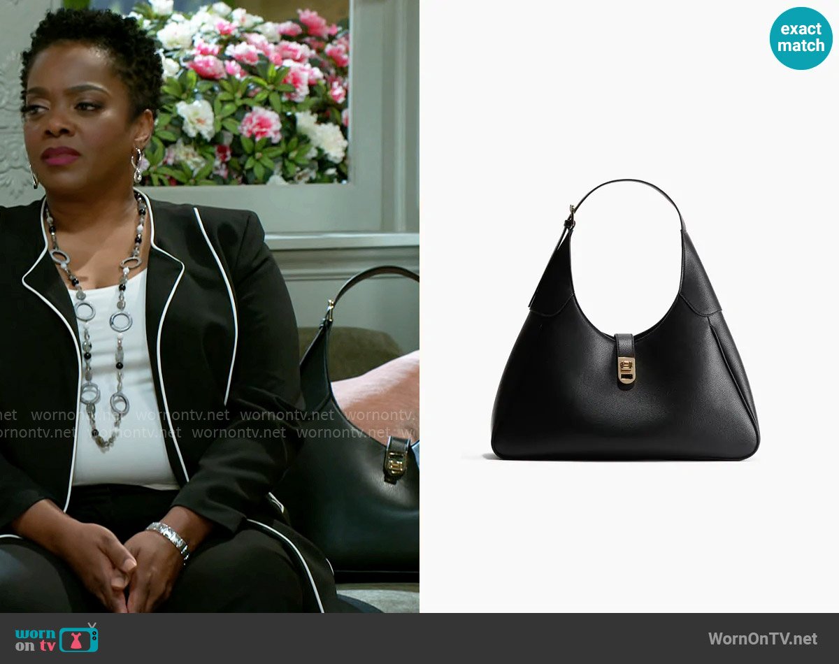 H&M Triangular Shoulder Bag worn by Mona Wilson (Karan Kendrick) on Beyond the Gates