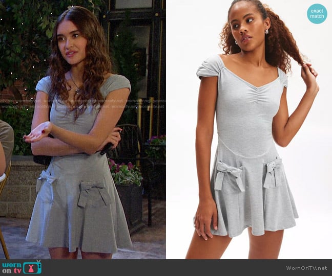 Kimchi Blue Ada Drop Waist Bow Pocket Mini Dress worn by Arianna Horton (Marissa Reyes) on Days of our Lives