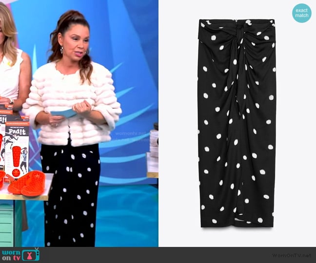 Gretta’s black polka dot print skirt on The View