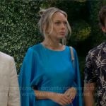 Abby’s blue satin cape dress on The Young and the Restless