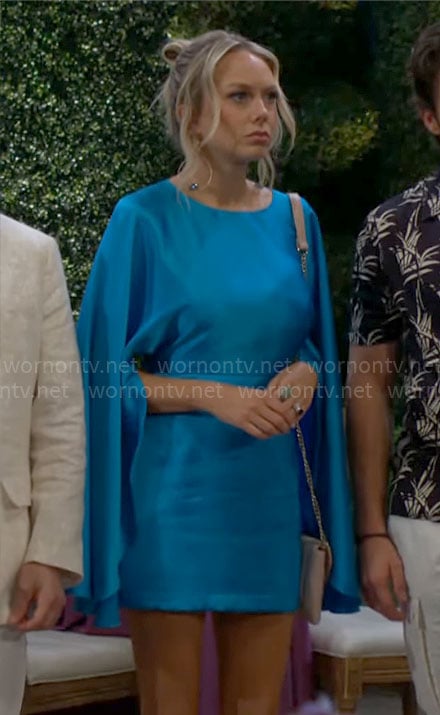 Abby’s blue satin cape dress on The Young and the Restless