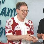 Adam Roberts’ red floral shirt on Access Hollywood