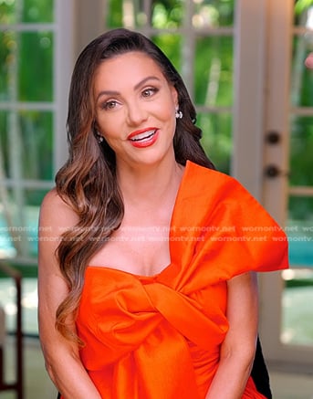 Adriana's red bow confessional dress on The Real Housewives of Miami