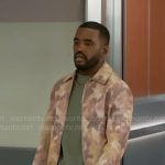 Andre’s blurred floral jacket on Beyond the Gates