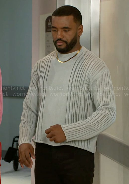 Andre's grey laddered sweater on Beyond the Gates