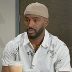 Andre’s white printed shirt on Beyond the Gates