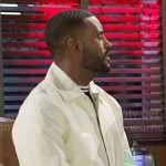 Andre’s off white jacket and side-stripe pants on Beyond the Gates