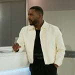 Andre’s off white jacket and side-stripe pants on Beyond the Gates