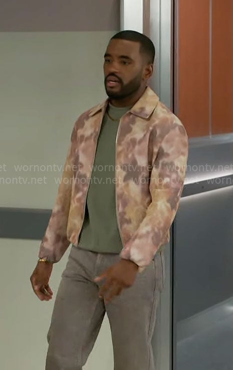 Andre's blurred floral jacket on Beyond the Gates