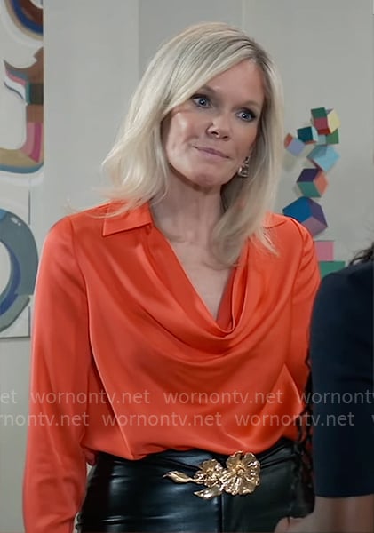 Ava’s red cowl-neck blouse and gold flower belt on General Hospital