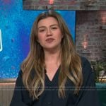 Kelly’s black short sleeve v-neck blouse on The Kelly Clarkson Show
