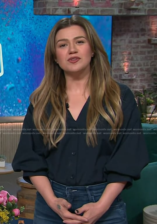 Kelly’s black short sleeve v-neck blouse on The Kelly Clarkson Show