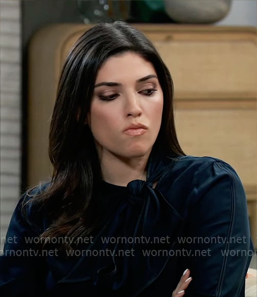 Brook Lynn's navy tie-neck blouse on General Hospital
