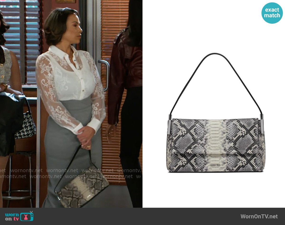 Calvin Klein Verne Flap Demi Shoulder Bag worn by Nicole Dupree Richardson (Daphnee Duplaix) on Beyond the Gates