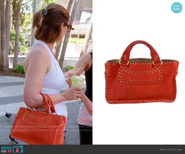 Celine Suede Studded Boogie Satchel in Red worn by Julia Lemigova (Julia Lemigova) on The Real Housewives of Miami