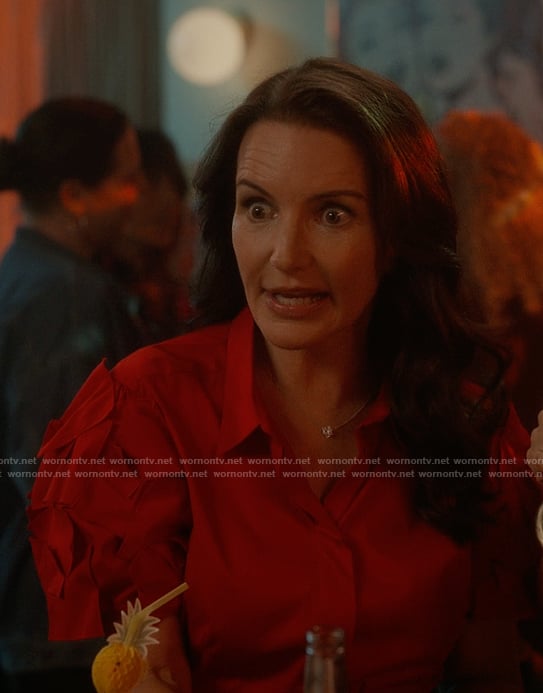 Charlotte’s red ruffle sleeve top on And Just Like That