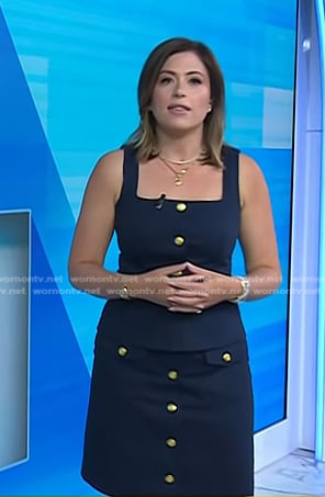 Chloe's navy sleeveless vest and mini skirt with gold buttons on Today