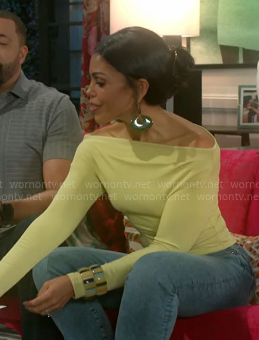 Dani's green earrings on Beyond the Gates