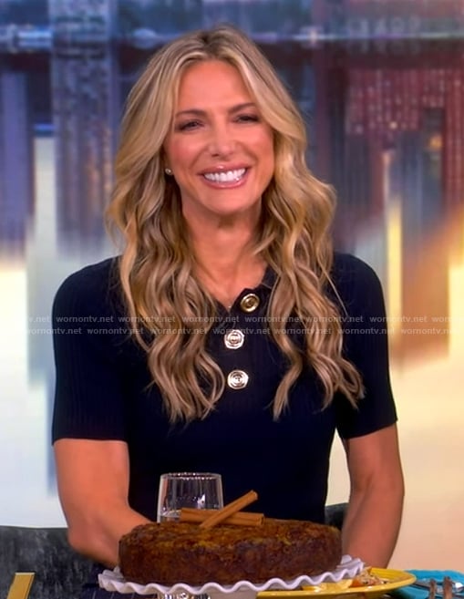 Debbie Matenopoulos’s navy sweater and pinstripe mini skirt on The View
