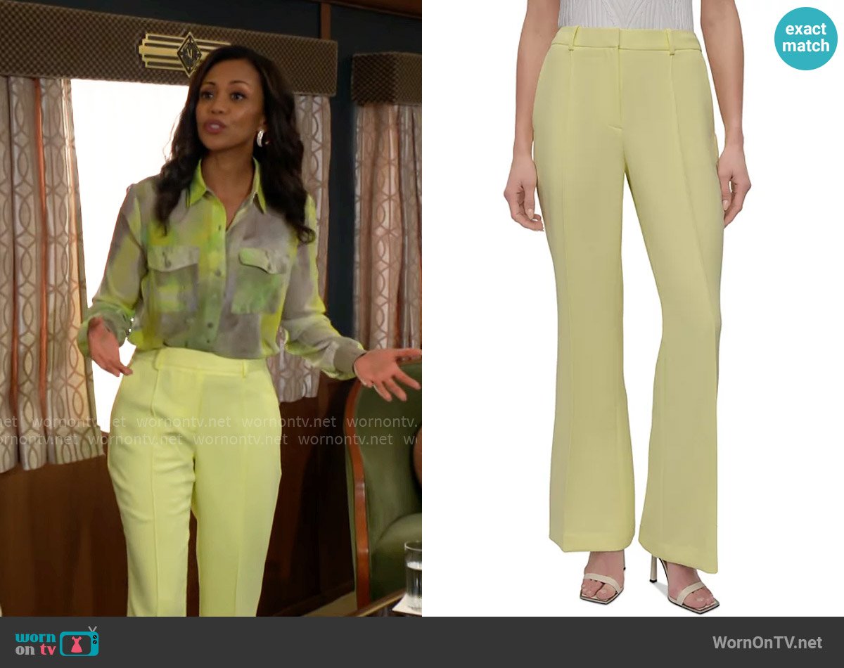 DKNY Mid-Rise Pleated Flare-Leg Pants in Light Lemon worn by Amanda Sinclair (Mishael Morgan) on The Young and the Restless