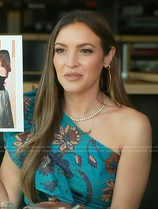 Emily’s blue floral print one shoulder jumpsuit on Access Hollywood