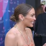 Emily’s coral pleated dress with chain strap on Access Hollywood